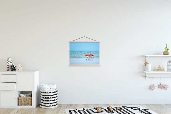 Affiche textielposter Quatre flamants roses sont sur la plage 40x30 cm - petite