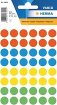 Verpakking met ronde, gekleurde etiketten in oranje, blauw, geel en groen