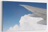 Schilderij - Vleugel van een vliegtuig — 100x70 cm