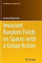 Invariant Random Fields on Spaces with a Group Action