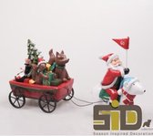 Père Noël avec ours polaire et chariot