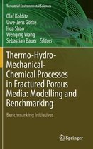 Thermo-Hydro-Mechanical-Chemical Processes in Fractured Porous Media: Modelling and Benchmarking