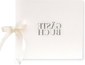 Leren design gastenboek - elegant design - modern wit - hoogwaardige letterveredeling - 84 pagina's - leeg blanco - bruiloft doopfeest - zilveren strik - luxe uitstraling