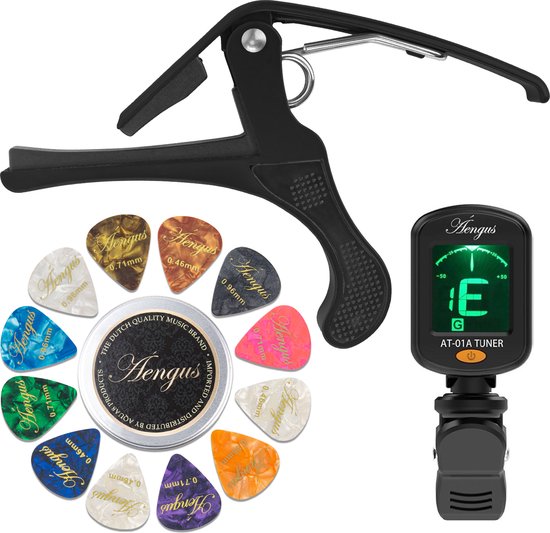 Foto:  engus accessoires set voor klassieke gitaar basis gitaartuner capo en blikje met 12 plectrums