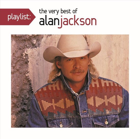 Playlist: De allerbeste van Alan Jackson. Alan Jackson draagt een cowboyhoed en een spijkerjack met een patroon in rood, bruin en beige.