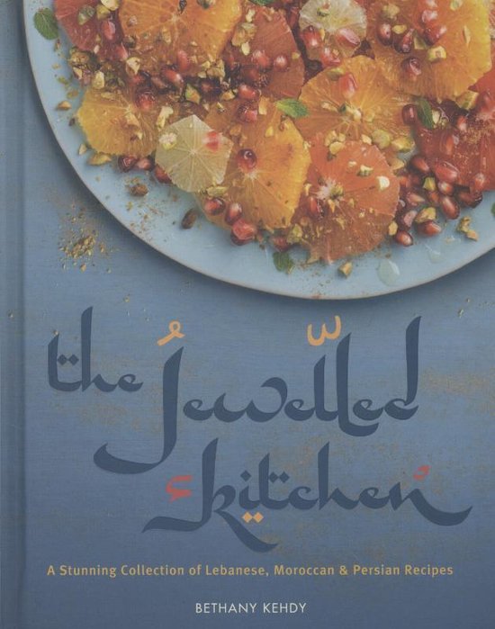Boekcover van 'The Jewelled Kitchen' met een kleurrijke fruitsalade en de titel in sierlijke letters.