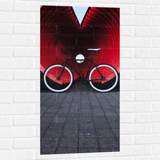WallClassics - Muursticker - Zwart met Witte Fiets geparkeerd voor Oranje Tunnel - 50x100 cm Foto op Muursticker