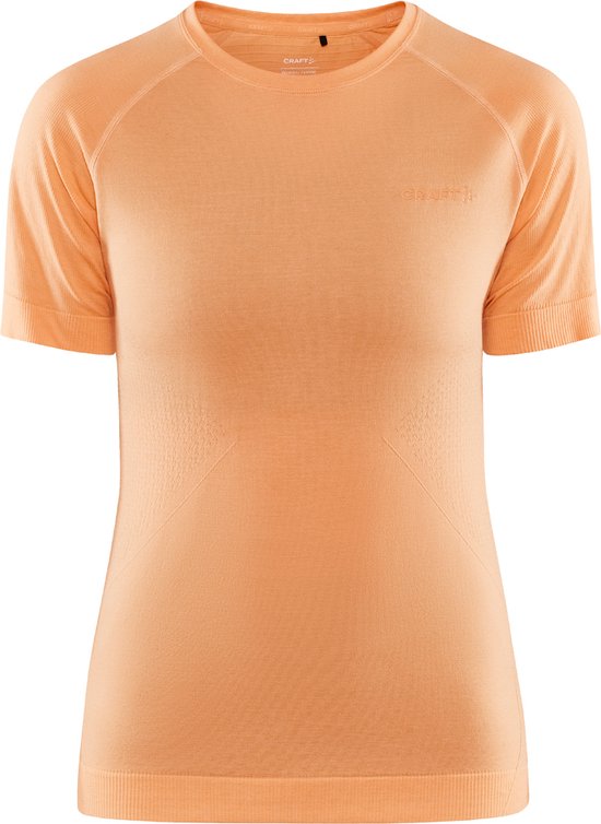 Dames oranje shirt met korte mouwen, Craft logo, met raglanmouwen en geribbelde boorden.
