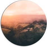WallClassics - Dibond Muurcirkel - Heuvellandschap met Oranjekleurige Lucht - 70x70 cm Foto op Aluminium Muurcirkel (met ophangsysteem)