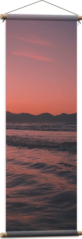 WallClassics - Textielposter - Golvende Zee met Oranje Paarse Lucht - 40x120 cm Foto op Textiel