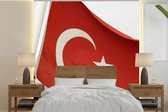 Behang - Fotobehang De vlag van Turkije wappert in de wind - Breedte 260 cm x hoogte 260 cm