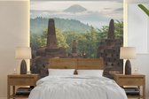 Behang - Fotobehang Fantastisch uitzicht over de jungle vanaf de Borobudur - Breedte 300 cm x hoogte 300 cm