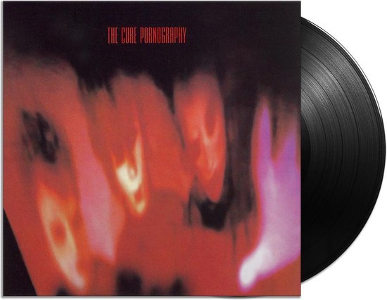 Albumhoes van The Cure Pornography, met een zwarte vinylplaat.