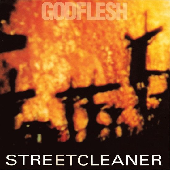 Godflesh Streetcleaner albumhoes met gloeiende oranje achtergrond en donkere silhouetten van kruisen.