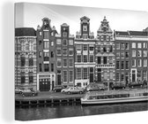 Canvas Schilderij Grachtenpanden in Amsterdam - zwart wit - 60x40 cm - Wanddecoratie