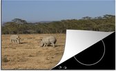 KitchenYeah® Inductie beschermer 81.2x52 cm - Neushoorns - Grazen - Safari - Kookplaataccessoires - Afdekplaat voor kookplaat - Inductiebeschermer - Inductiemat - Inductieplaat mat
