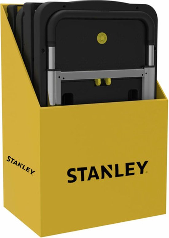 Een gele Stanley displaydoos met drie ingeklapte zwarte platte handwagens.