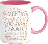 80 Jaar Legendarische Gebrouwen Mok met tekst | Oranje - Zilver | Grappig Verjaardag Beker Cadeau | Bedrukte Mokken | Roze | 330 ML