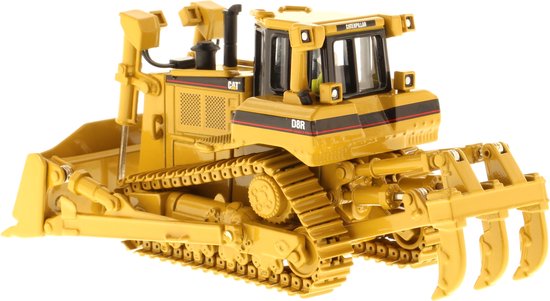 Gele Caterpillar D8R bulldozer met grijper aan de voorzijde.