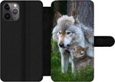 Bookcase Geschikt voor iPhone 11 Pro Max telefoonhoesje - Wolf - Mos - Bos - Pup - Met vakjes - Wallet case met magneetsluiting
