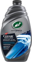 Grijze fles Turtle Wax Hybrid Solutions Ceramic Wash & Wax met een blauwe afbeelding van een auto.