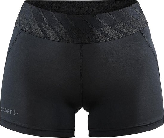 Short de sport noir avec une large ceinture brillante et rayée, et logo 'CRAFT'.