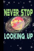 Never Stop Looking Up: Outer Space Theme 6x9 120 Page College Ruled Composition Notebook