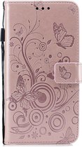 Apple iPhone 5 / 5s / SE Bookcase - Roze - Vlinders - Bloemen - Portemonnee Hoesje - Pasjeshouder