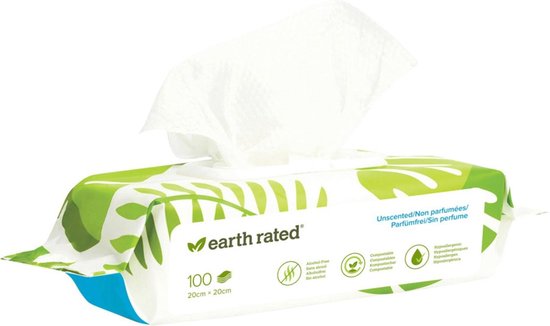 Pak hondendoekjes met groene bladerenprint, open met een doekje eruit. Beschrijvingen in het Engels en Frans.