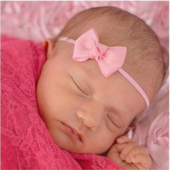 Roze baby / new born haarband met strikje | bol.com