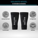 Zwarte Vynix Ballers scheenbeschermers met infofiches over stevig materiaal, lichtgewicht, comfortabel en rekbaar.
