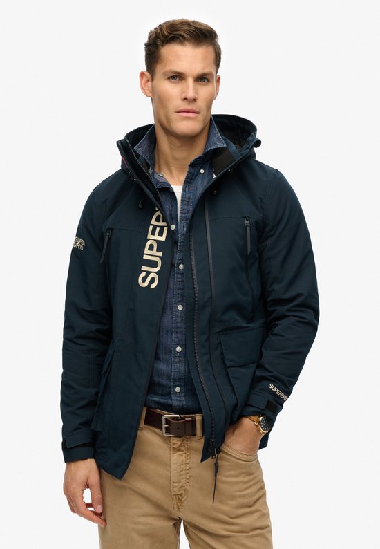 Superdry - Ultimate Windbreaker met capuchon en borduursel - Heren