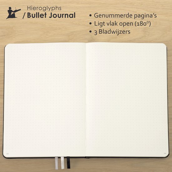 Open rode Hieroglyphs Bullet Journal met gepunkte pagina's, genummerde pagina's en drie bladwijzers.