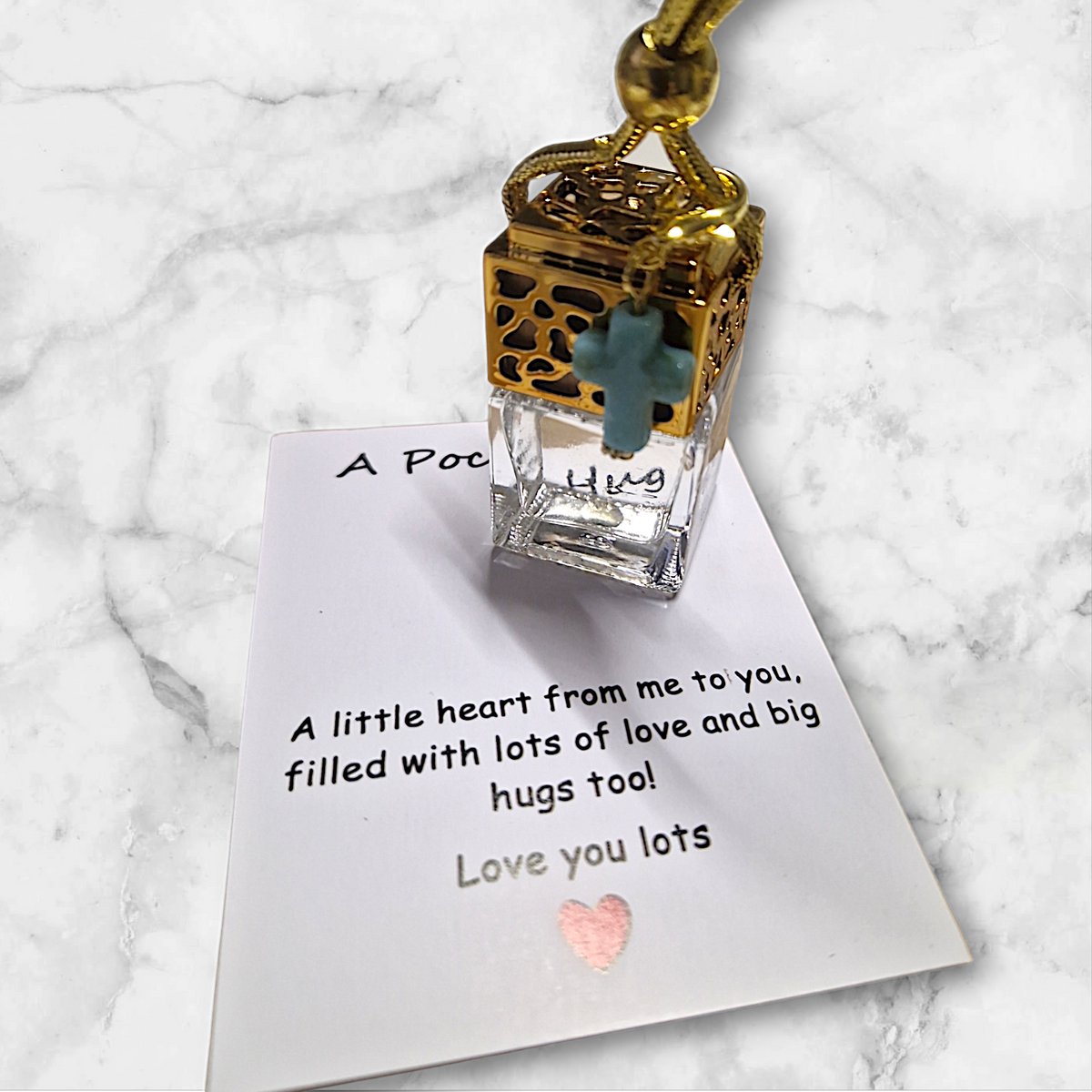 Auto parfum - Believe - Met pocket Hug - Kruisje - 8ml - Serenity - Turquoise - Autoparfum - Traditional Ritual Overseas - Valentijnsdag - Autogeur - Auto Parfum - Auto parfum mannen - Auto parfum vrouwen - Verjaardagscadeau - Cadeautje