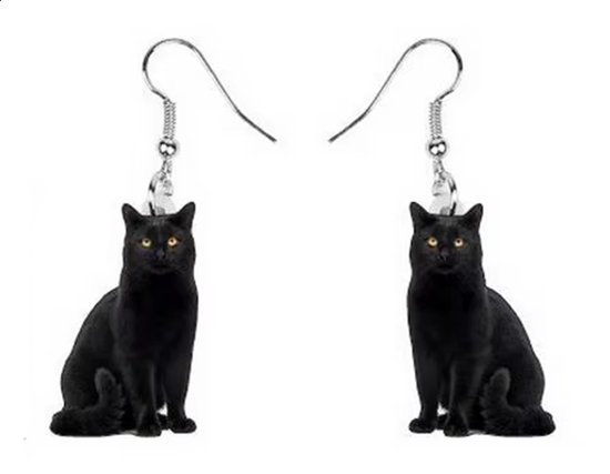 Boucles d'oreilles chat noir aux yeux jaunes, assis.
