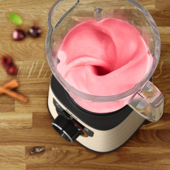 Gouden Tefal blender met roze smoothie in de glazen kan.