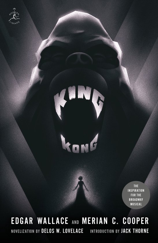 Boekcover van King Kong met een grote aap die zijn bek opent, met de tekst 'KING KONG' en 'THE INSPIRATION FOR THE BROADWAY MUSICAL'.