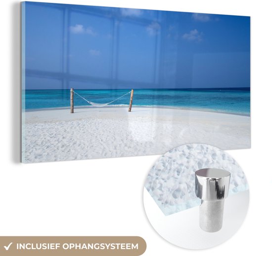 MuchoWow® Glasschilderij 120x60 cm - Schilderij acrylglas - Strand - Hangmat - Lucht - Foto op glas - Schilderijen
