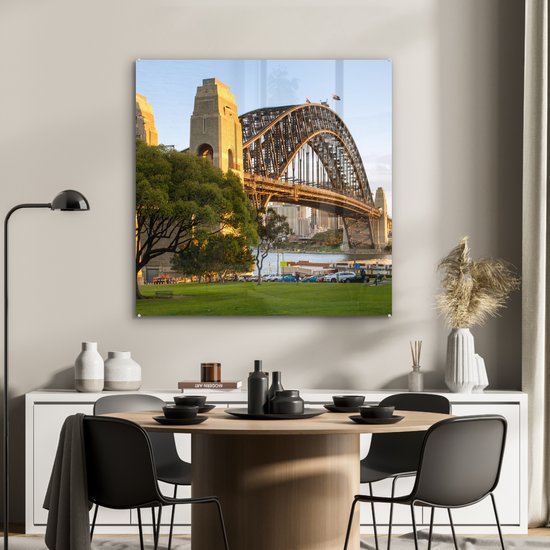 MuchoWow® Glasschilderij 90x90 cm - Schilderij acrylglas - Sydney Harbour Bridge in Australië in de middag - Foto op glas - Schilderijen
