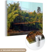 MuchoWow® Glasschilderij 120x90 cm - Schilderij acrylglas - Bamboebrug - Foto op glas - Schilderijen