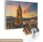 MuchoWow® Glasschilderij 180x120 cm - Schilderij acrylglas - De kathedraal van Málaga tijdens de zonsondergang - Foto op glas - Schilderijen