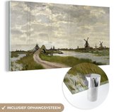 MuchoWow® Glasschilderij 160x80 cm - Schilderij acrylglas - Windmills at Haaldersbroek, Zaandam - Schilderij van Claude Monet - Foto op glas - Schilderijen