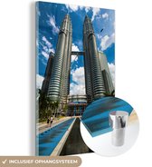MuchoWow® Glasschilderij 120x180 cm - Schilderij acrylglas - Vooraanzicht van de Petronas Towers - Foto op glas - Schilderijen