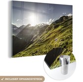 MuchoWow® Glasschilderij 30x20 cm - Schilderij acrylglas - Grasrijk berggebied - Foto op glas - Schilderijen