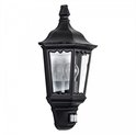 Zwarte klassieke wandlamp met glas en bewegingssensor.
