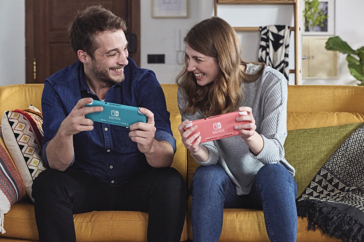 Nintendo Switch Lite Coral — handheld gaming console thumbnail 2