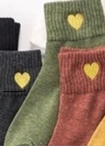 Groene sokken met goud hartje