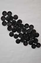 Mooie 19 mm, 4 gaats, zwarte met grijs design knoop. Zakje van 25 stuks.