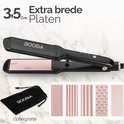 Zwarte stijltang met 3,5 cm brede rosegouden platen, inclusief opbergzakje en verwisselbare platen.