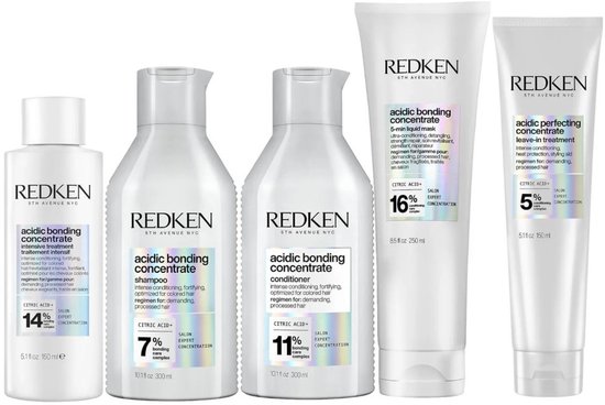 Redken Acidic Bonding Concentrate: intensive treatment, shampoo, conditioner, liquid mask, leave-in treatment in witte flacons en tubes.